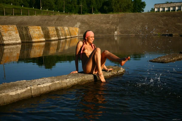 Naked teen models near a canal with her hair in braided pigtails  - Teen, Outdoor, Beautiful, Tiny Tits, Babe, Amateur, Solo, Ass, Spreading, Pussy  - Photo 5
