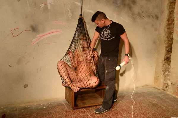 Naked blonde Sandy gets masturbated with a vibrator while trapped in a net  - BDSM, Bondage, Skinny, Spreading, Blonde, Outdoor  - Photo 1