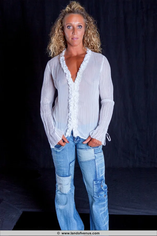 Blonde bodybuilder with tiny tits flexes while topless in blue jeans  - Sports, Tiny Tits, Amateur, Jeans, MILF, PAWG, Clothed, Ass, Babe, Beautiful  - Photo 1