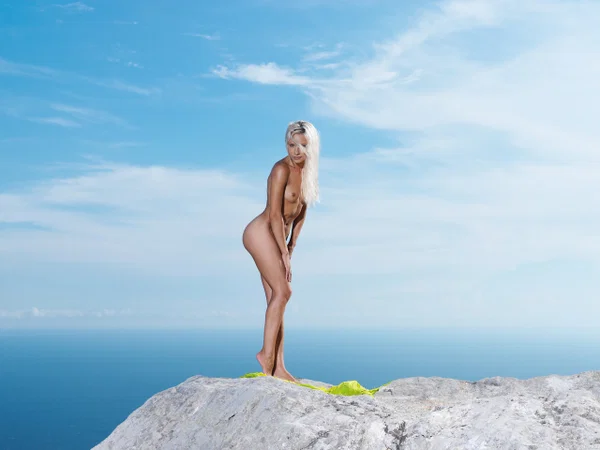 Gorgeous platinum blonde Adelia A strikes great nude poses atop a high rock  - Petite, Beautiful, Teen, Outdoor, Sexy, Blonde, Amateur, Glamour, Solo, Ass  - Photo 7