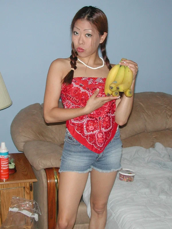 Naughty Asian babe Ayako toys her trimmed pussy with a ripe banana  - Asian, Pussy, Amateur, Redhead, Petite, Pigtails, Bath, Tiny Tits, Shower, Dildo  - Photo 1