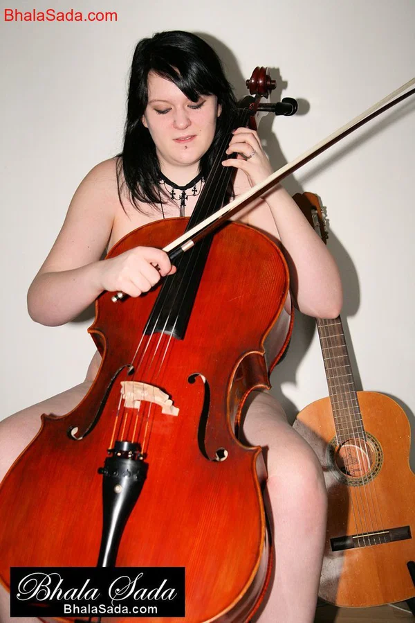 Raven-haired MILF Bhala Sada sitting in a chair playing the cello in the nude  - MILF, Non Nude, Beautiful, Brunette, Babe, Solo  - Photo 13