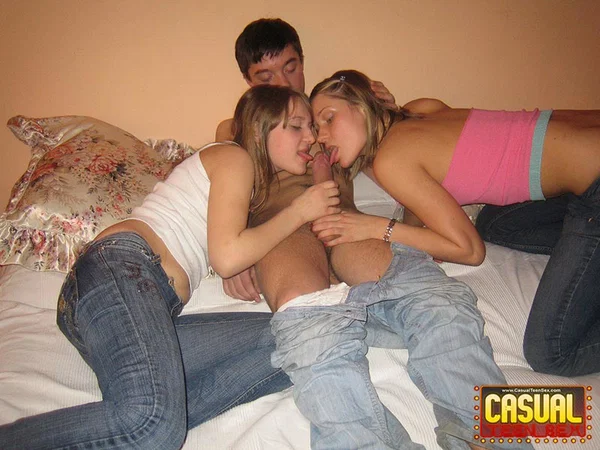 College girls have a threesome with their fuck buddy on top of a bed  - Amateur, College, Threesome, Handjob, Seduction, Teen, Jeans, FFM, Cute, Kissing  - Photo 6