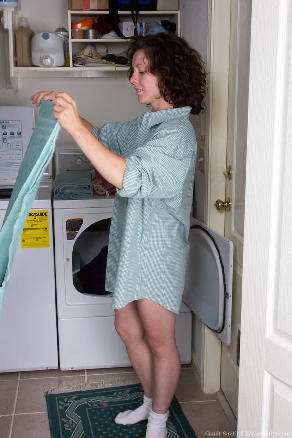 Petite cutie with hairy vagina Candy Smith undresses in laundry room  - Wife, Curly, Amateur, Undressing, Hairy, Socks, PAWG, Natural Tits, Brunette, Pussy  - Photo 2