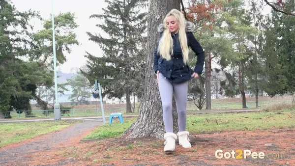 Blonde girl Victoria Pure pulls down her leggings to pee against a public tree  - Pissing, Public, Beautiful, Czech, Outdoor, Blonde, Close Up, Pussy, Shaved, Babe  - Photo 13
