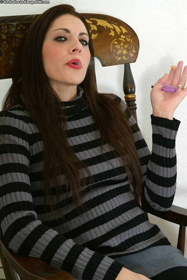 Older smoking lady Dahlia posing in the nude after peeling off black pantyhose  - Mature, Pantyhose, Clothed, Pussy, Ass, Spreading, Hairy, Tattoo, Shorts, Tiny Tits  - Photo 1