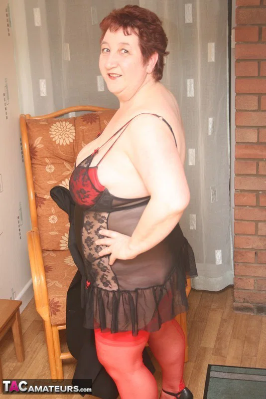 Mature redheaded BBW Kinky Carol releases her huge boobs from lingerie  - Mature, Chubby, Thick, Short Hair, Lingerie, Curvy, BBW, Stockings, Big Tits, High Heels  - Photo 8