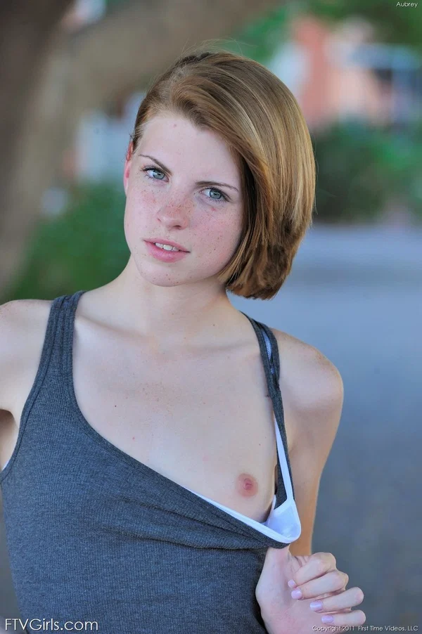 Redhead teen Aubrey shyly takes her time stripping off on the street  - Face, Teen, Cute, Tiny Tits, Outdoor, Skinny, Redhead, Babe, Jeans, Sandals  - Photo 2