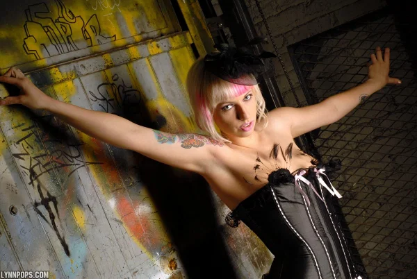 Amateur model Lynn Pops sports dyed hair in a corset and nylons  - Lingerie, Amateur, Stockings, Blonde, Leather, Panties, Babe, Ass, Beautiful, Tattoo  - Photo 3
