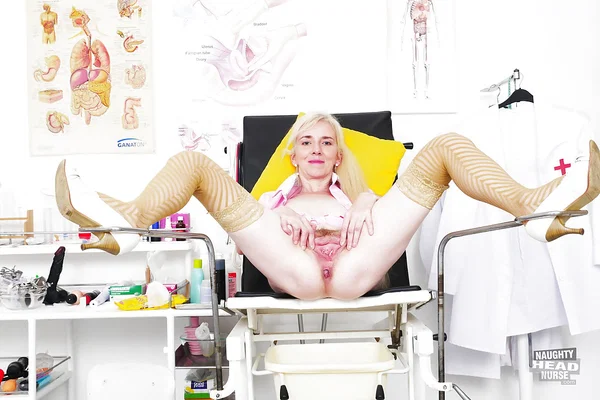 Older blonde nurse rids uniform before toying hairy cunt with large sex toy  - Nurse, Anal Gape, Pussy, Spreading, Hairy, Mature, Masturbation, Nipples, Close Up, Dildo  - Photo 5