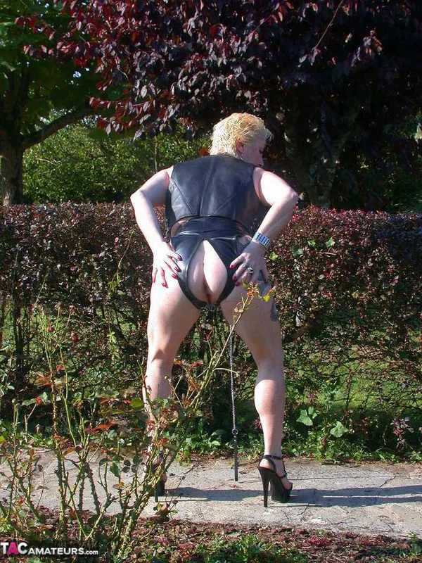 Busty older blonde Mary Bitch goes topless in a yard in crotchless underwear  - Mature, Short Hair, Amateur, Leather, Big Tits, Outdoor, Natural Tits, High Heels, PAWG, Ass  - Photo 4