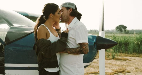 European girlfriend Carolina Abril making out with her man in his helicopter  - Reality, Erotic, Glasses, Non Nude, Pornstar, Outdoor, Brunette, Clothed  - Photo 1