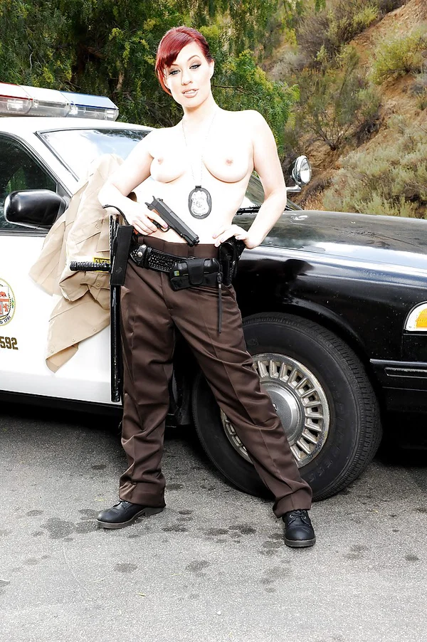 Redhead pornstar babe Jessica Ryan strips off police uniform outdoors  - Police, Outdoor, Redhead, Pornstar, Clothed, Babe, Big Tits, Ass, Boots, Uniform  - Photo 8