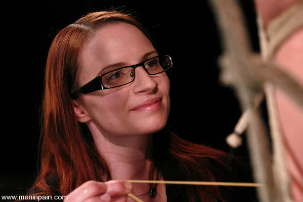 Mistress Claire Adams dominates a submissive man while he is in bondage  - MILF, Femdom, Redhead, Glasses, BDSM, Bondage, Dildo  - Photo 2