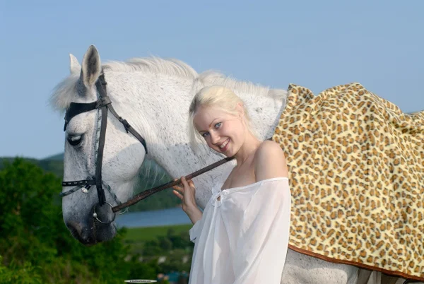 Hot blonde with long hair gets totally naked next to a saddled horse  - Outdoor, Beautiful, Ass, Big Tits, PAWG, Babe, Solo, Blonde, Non Nude, Cute  - Photo 3