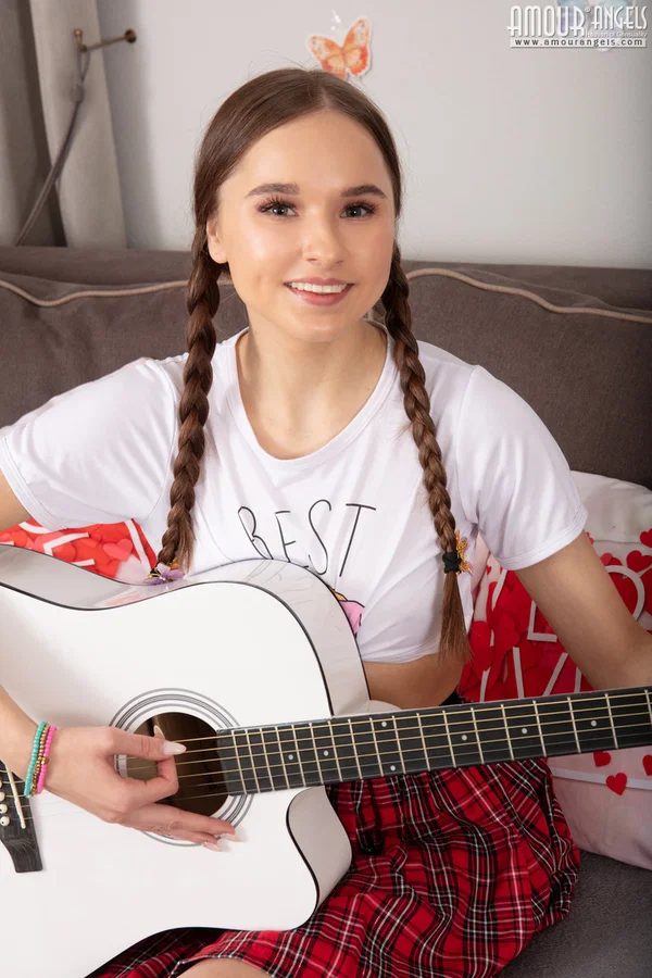 Petite teen with braided pigtails gets totally naked while playing a guitar  - Teen, Pussy, Pigtails, Skirt, Spreading, Clothed, Amateur, Skinny, Legs, Shaved  - Photo 2