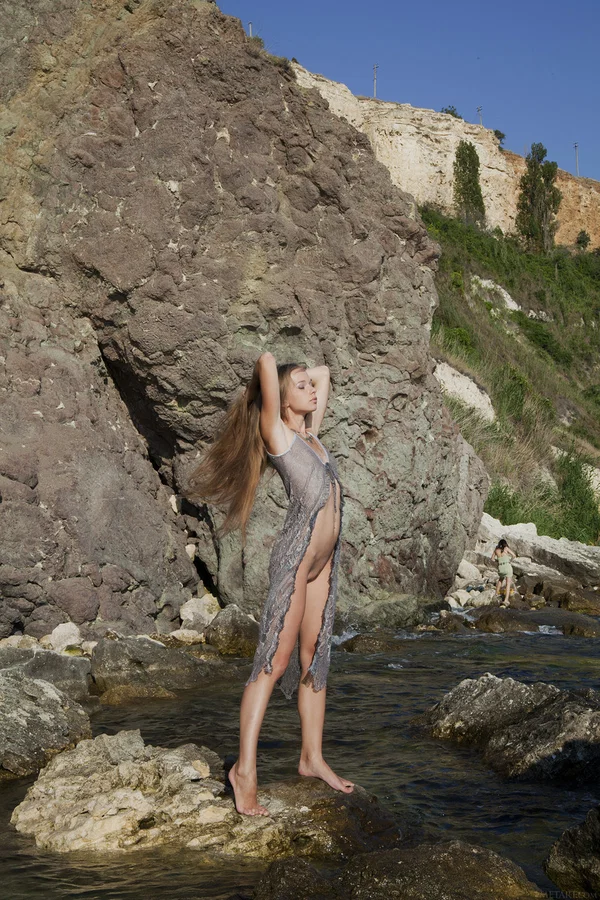 Slim teen gets caught in the act of removing her see thru dress on boulders  - Beach, Beautiful, Babe, Tiny Tits, Outdoor, Amateur, Sexy, Teen, Skinny, Cute  - Photo 2