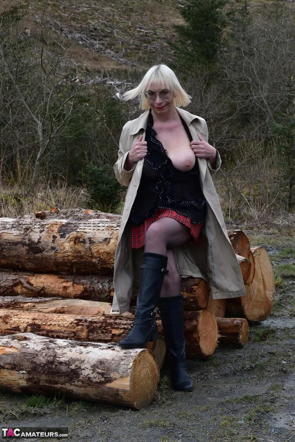 Thick blonde Barby Slut strips to black boots alongside a stream  - Saggy Tits, Boots, Outdoor, Short Hair, Glasses, Pantyhose, BBW, Curvy, Chubby, Thick  - Photo 2