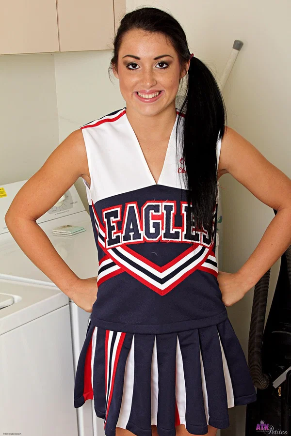 Young Latina girl Lola Foxx removes cheerleader attire during a SFW gig  - Cheerleader, Petite, Latina, Teen, Cute, Non Nude, Spreading, Amateur, Brunette, White  - Photo 1
